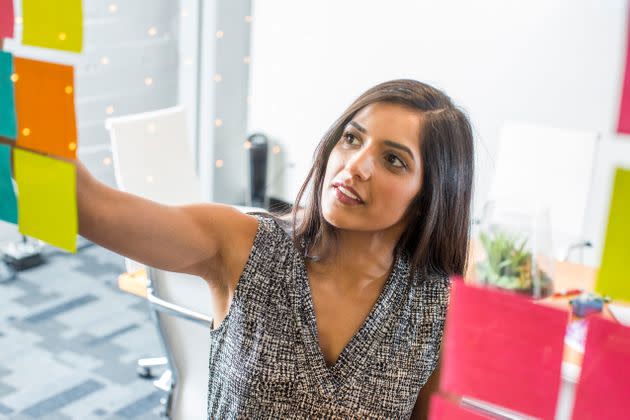 Research has found that Asians face a double bind at work: If they act more dominant, they will be less liked, but if they do not assert dominance, they will not be seen as leaders. (Photo: Adam Hester via Getty Images)