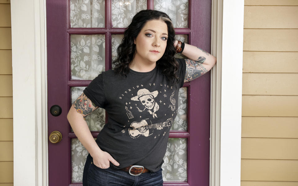 FILE - In this March 5, 2018, file photo, Ashley McBryde poses in Nashville, Tenn. Her new album “Never Will," out on Friday, is full of songs about opinionated women, small town secrets, motel trysts and revenge fantasies. (AP Photo/Mark Humphrey, File)