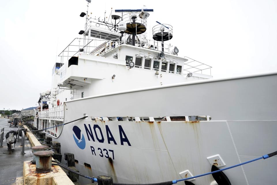 The NOAA Okeanos Explorer sits at a dock on Friday, June 23, 2023, in Kodiak, Alaska. The ship, a reconfigured former U.S. Navy vessel run by civilians and members of the NOAA Corps, is specially outfitted with technology and tools needed to access deep into the ocean, and to share that data with the public and on-shore researchers in real-time. (AP Photo/Joshua A. Bickel)