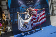 <p>Soccer fans pose for a photograph one day ahead of the Champions League final in Milan, Italy, May 27, 2016. The Champions League soccer final between Real Madrid and Atletico Madrid will be held at the San Siro stadium, Milan, on 28 May. (Oliver Weiken/EPA) </p>