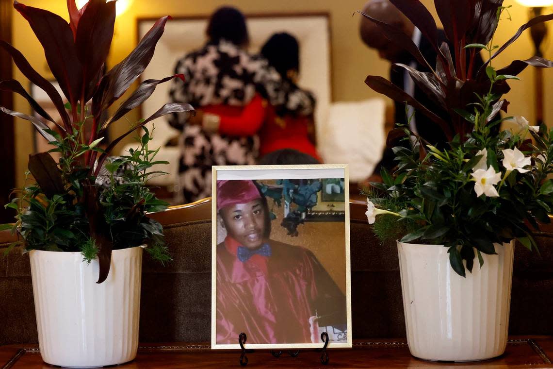 Family take a moment at Anthony Johnson Jr.’s viewing prior to his funeral on Friday, May 24, 2024, in Mansfield. Johnson was killed while in custody at the Tarrant County Jail in April.