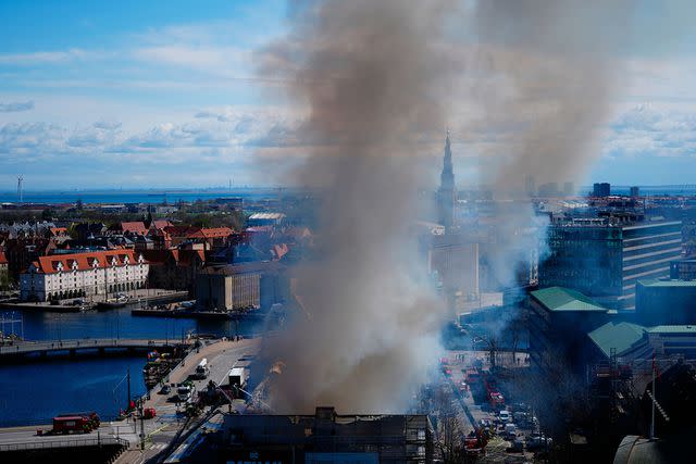 <p>Ida Marie Odgaard/EPA-EFE/Shutterstock </p> Denmark's 400-year-old stock exchange on fire