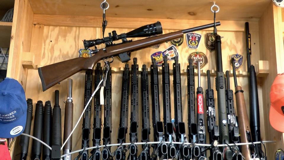 A rack of rifles are shown inside a New Jersey gun shop in July 2020. A two-year set of Alcohol, Tobacco, Firearms and Explosives records found many of the weapons dealers recommended to lose their licenses instead kept them. The New Jersey shop was not cited in the records reviewed by reporters.