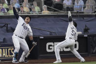 Tampa Bay Rays Randy Arozarena (56) celebrates his two run home run against the Houston Astros with Ji-Man Choi during the first inning in Game 7 of a baseball American League Championship Series, Saturday, Oct. 17, 2020, in San Diego. (AP Photo/Jae C. Hong)