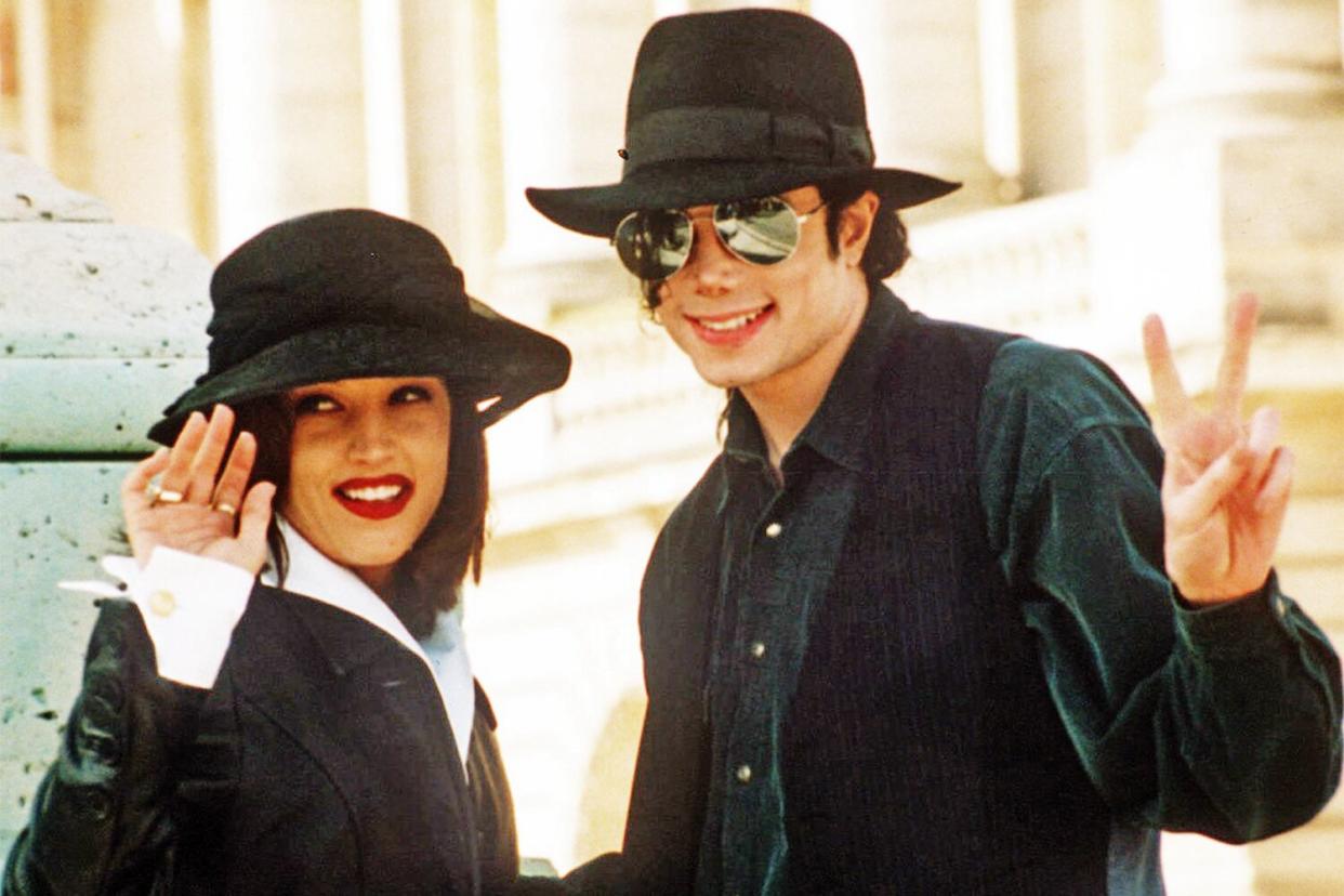 Mandatory Credit: Photo by Laurent Rebours/AP/Shutterstock (7261327a) PRESLEY Pop star Michael Jackson and his wife Lisa Marie Presley wave to photographers as they visit the Versailles castle near Paris. Presley and Jackson became close in the early 1990s. They wed amid a swirl of publicity in 1994, after Jackson faced accusations of child molestation (later settled out of court) and canceled concerts for health reasons. They divorced two years later Celeb-Curious Couplings, PARIS, France
