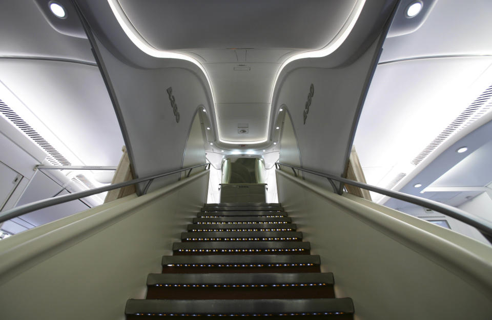 FILE- In this March 19, 2007, file photo the interior stairs that connect the two passenger decks of an Airbus A380 are shown during a press tour of the new plane at New York's Kennedy International Airport. European plane maker Airbus said Thursday, Feb. 14, 2019, that it will stop making its superjumbo A380 in 2021 for lack of customers, abandoning the world's biggest passenger jet and one of the aviation industry's most ambitious and most troubled endeavors. (AP Photo/Mark Lennihan, File)