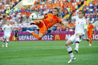 (L-R) Ibrahim Afellay of Holland,Daniel Agger of Denmark during the UEFA EURO 2012 match between Holland and Denmark at the Metalist Stadium on June 9, 2012 in Kharkov, Ukraine. (Photo by VI Images via Getty Images)