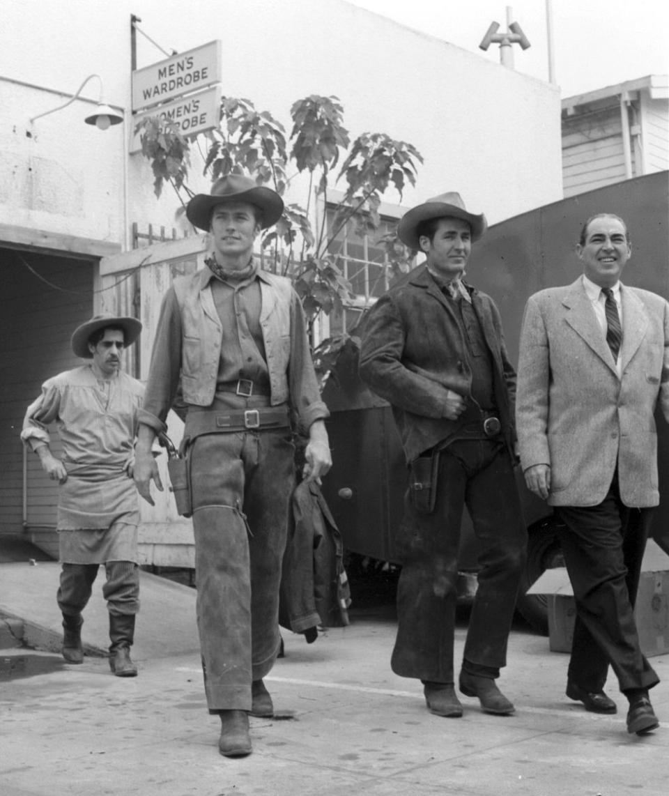 <p>The actor caught his big break in 1959, when CBS cast him in their new western television series, <em>Rawhide</em>. Here, Eastwood leaves wardrobe on the CBS lot. </p>