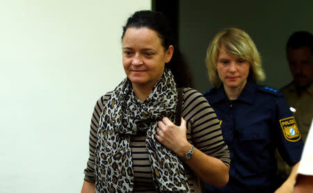 Defendant Beate Zschaepe, accused of helping to found a neo-Nazi cell called the National Socialist Underground (NSU), arrives for the continuation of her trial at a courtroom in Munich, Germany, July 19, 2017. REUTERS/Michaela Rehle