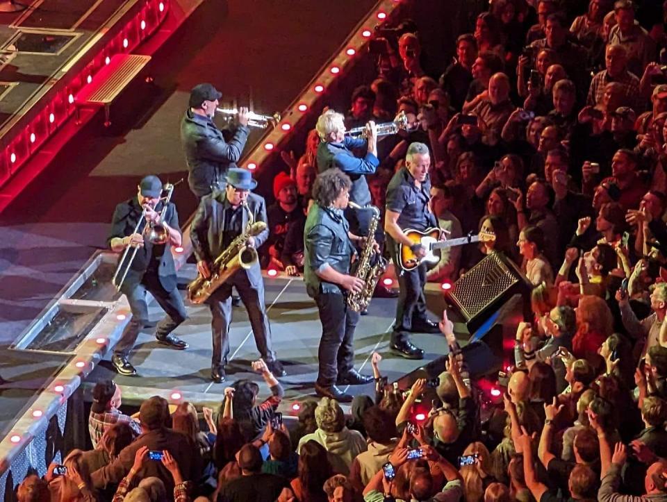 Bruce Springsteen performs at Atlanta's State Farm Arena Friday, Feb. 3, along with the five-person horn section from the E Street Band: Ozzie Melendez, trombone; Barry Danielian, trumpet; Eddie Manion, sax; Curt Ramm, trumpet; Jake Clemons, sax.