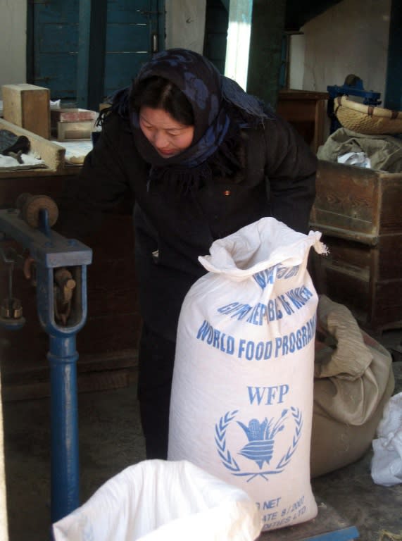 A World Food Programme picture of a woman collecting food rations at a Public Distribution Centre in Sohung County north Hwanghae province, North Korea