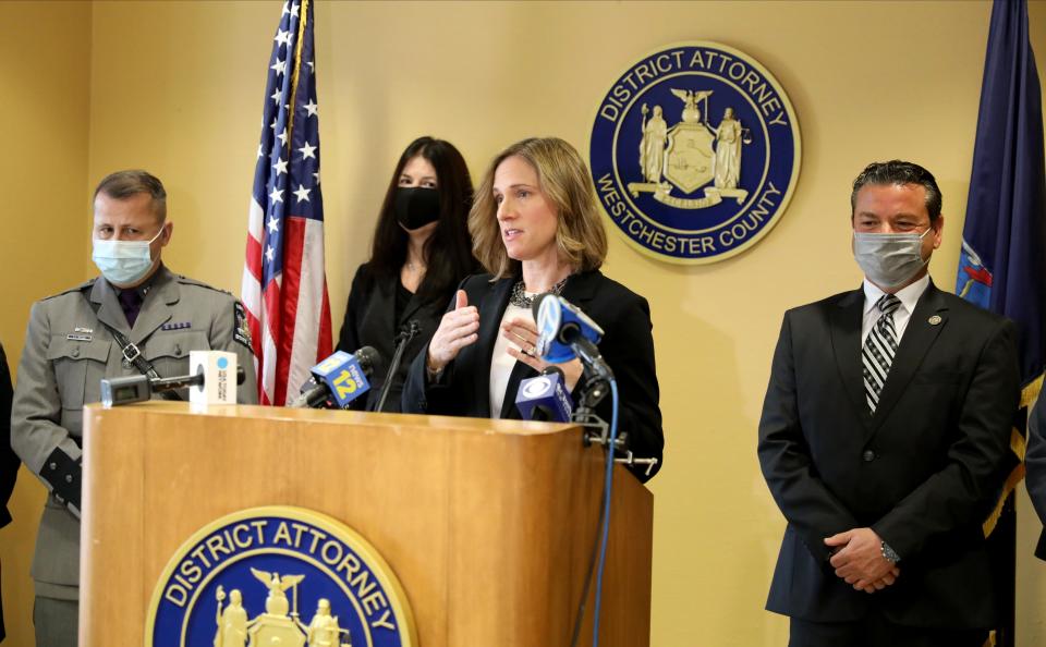 Westchester County District Attorney Mimi Rocah delivers remarks concerning the Robert Durst investigation at her office in White Plains, Jan. 19, 2022. At right is retired New York State Police Investigator Joseph Becerra. 