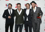 Carles Campi Campon, from left, Jorge Drexler, Pablo Martin Jones and Jesus Martos pose in the press room with the award for record of the year for "Telefonia" at the Latin Grammy Awards on Thursday, Nov. 15, 2018, at the MGM Grand Garden Arena in Las Vegas. (Photo by Eric Jamison/Invision/AP)