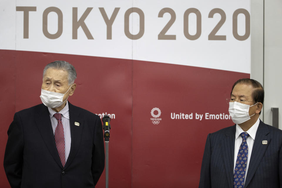 Tokyo Olympic and Paralympic Games Organising Committee (TOGOC) President Yoshiro Mori, left, and CEO Toshiro Muto speak to the media after their video conference with IOC President Thomas Bach, at the TOGOC headquarters in Tokyo Thursday, Jan. 28, 2021. The IOC and organizers in Japan repeatedly insisted on Wednesday there is no Plan B for the Tokyo Games, which were already postponed by one year during the coronavirus pandemic. (Takashi Aoyama/Pool Photo via AP)