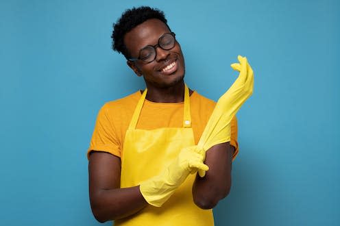 <span class="caption">Even men who want to do their fair share of chores often fail to pull their weight.</span> <span class="attribution"><a class="link " href="https://www.shutterstock.com/image-photo/african-american-man-glasses-putting-on-1825588013" rel="nofollow noopener" target="_blank" data-ylk="slk:Koldunov/Shutterstock;elm:context_link;itc:0;sec:content-canvas">Koldunov/Shutterstock</a></span>