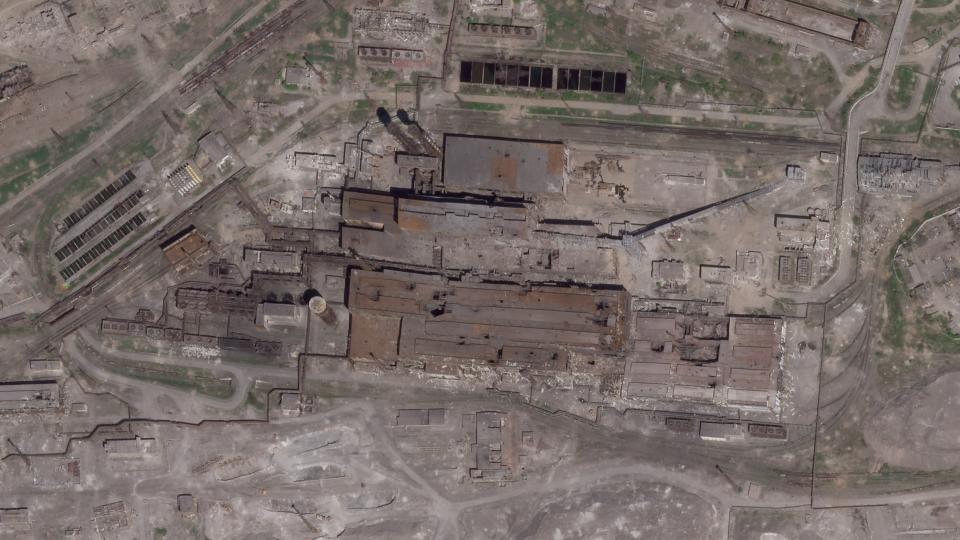 FILE - This satellite image from Planet Labs PBC shows damage at the Azovstal steel mill in Mariupol, Ukraine, April 30, 2022. With the evacuation of some civilians from a sprawling steel mill besieged by Russian forces, attention is turning to the fate of hundreds of Ukrainian troops still inside after weeks in the warren of underground tunnels and bunkers. (Planet Labs PBC via AP, File)