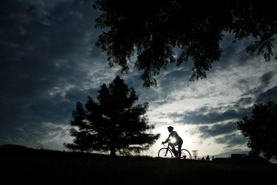 Cyclists make their way to out of Waukee on the Raccoon River Valley trail during the annual BACooN ride.