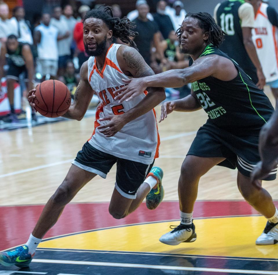 Lake Wales' Alante Fenner is in action at the Inaugural Polk Hoops Alumni Tournament on Saturday at Polk State College.