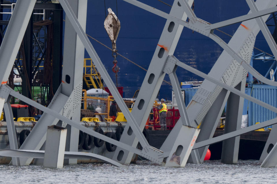 Salvage work continues on the collapsed Francis Scott Key Bridge, Thursday, April 25, 2024, in Baltimore. (AP Photo/Matt Rourke)