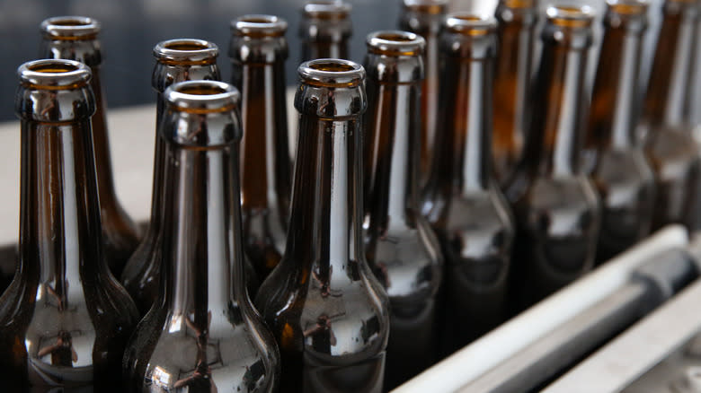 empty brown beer bottles