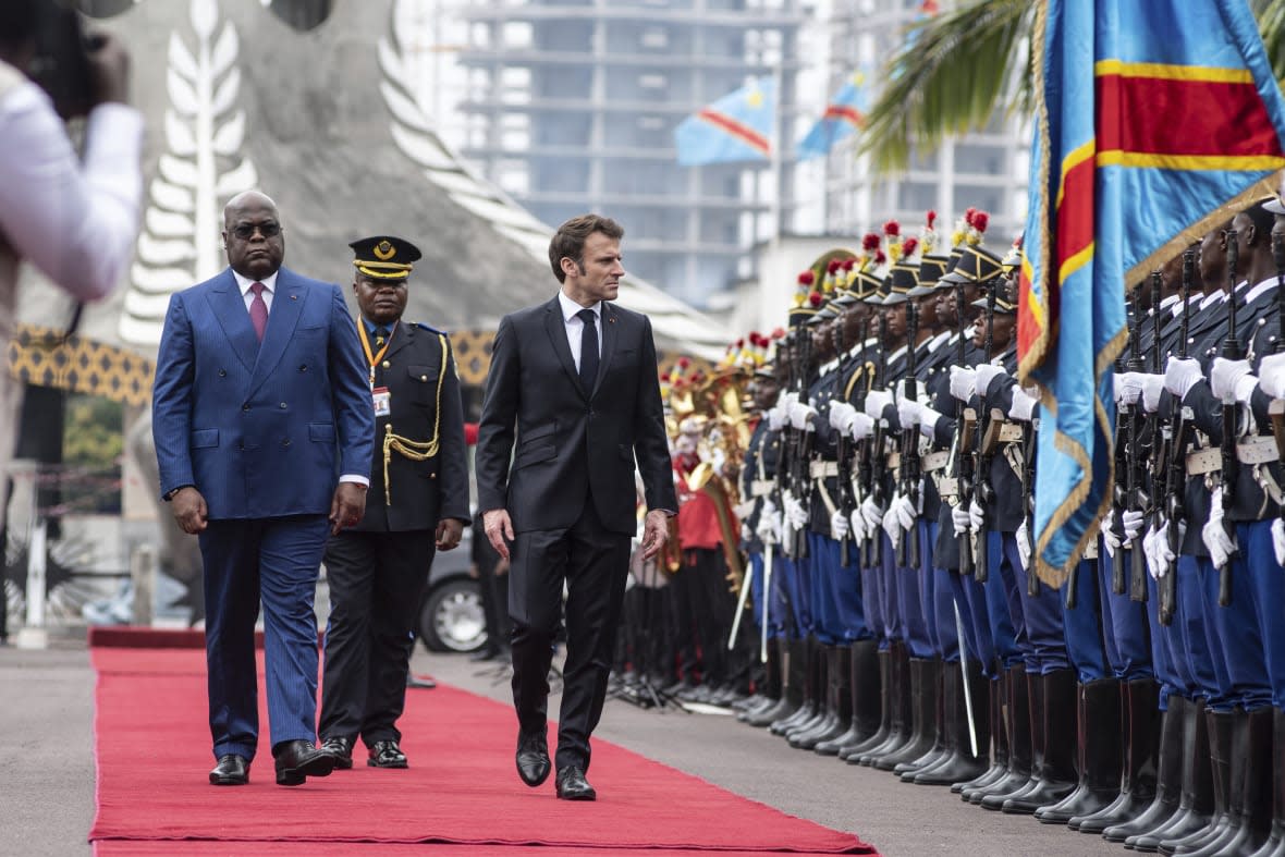 French President Emmanuel Macron, reviews troops withDemocratic Republic of the Congo President Felix Tshisekedi in Kinshasa Saturday March 4, 2023. Macron, on the last leg of an ambitious Africa trip that took him to Gabon, Angola, the Republic of Congo and Congo, wants to roll out more ambitious economic policies, in a bid to boost France’s waning influence in the continent (AP Photo/Samy Ntumba Shambuyi)