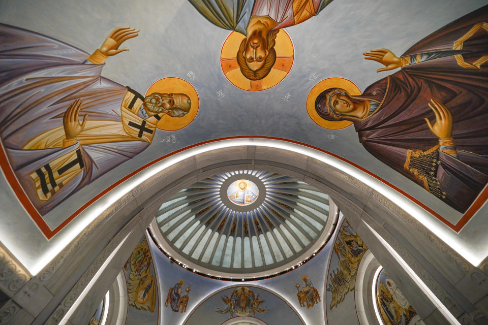 Paintings adorn the interior of St. Nicholas Greek Orthodox Church in New York, Tuesday, Dec. 6, 2022. After a rebuilding process that lasted more than two decades, the Greek Orthodox church that was destroyed in the Sept. 11 attacks has reopened at the World Trade Center site. The St. Nicholas Greek Orthodox Church and National Shrine, designed by architect Santiago Calatrava, now overlooks the Trade Center memorial pools from an elevated park. (AP Photo/Seth Wenig)