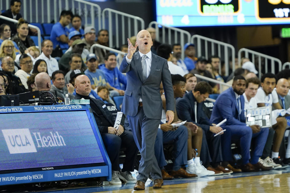 UCLA head coach Mike Cronin gestures during the first half of an NCAA college basketball game against St. Francis, Monday, Nov. 6, 2023, in Los Angeles. (AP Photo/Ryan Sun)