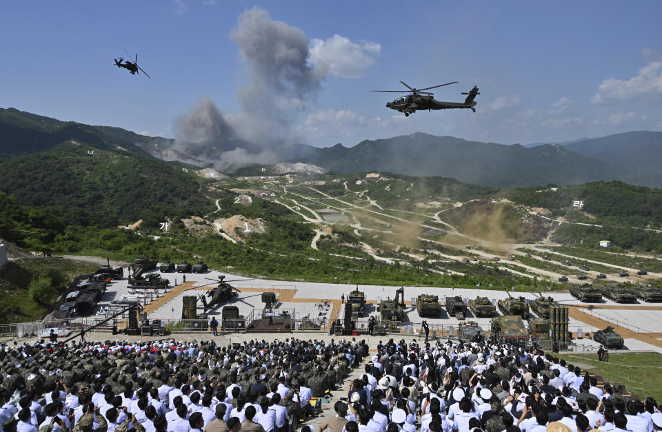 Visitors watch a South Korea-U.S. joint military drill at Seungjin Fire Training Field in Pocheon, South Korea Thursday, June 15, 2023. (Jung Yeon-je/Pool Photo via AP)