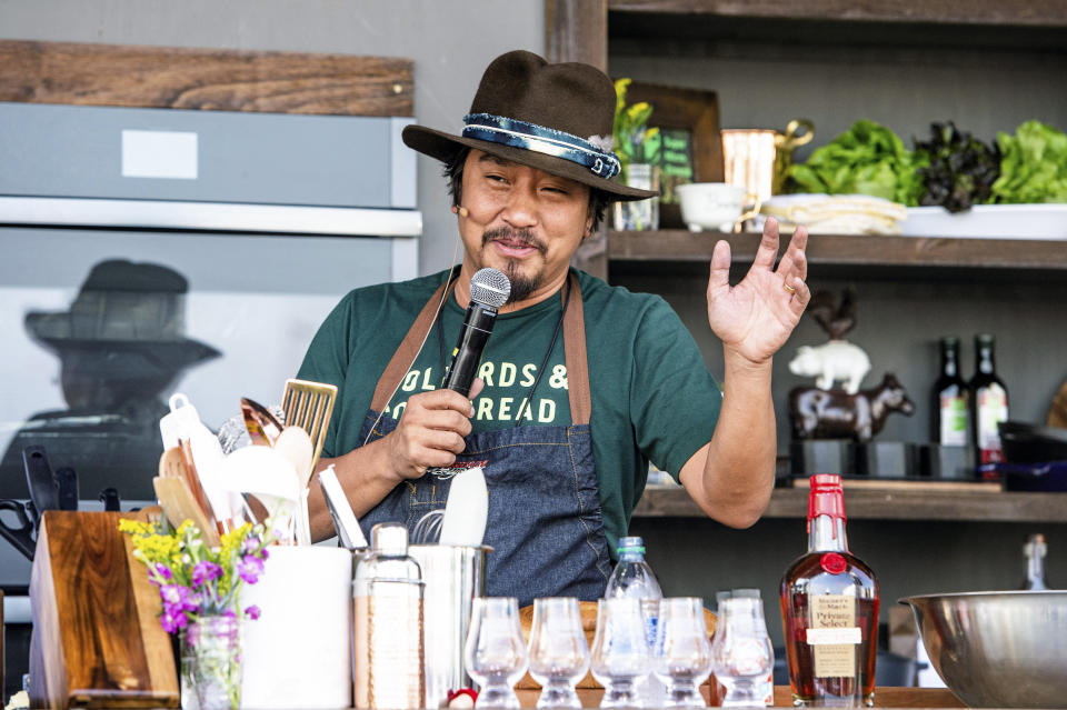 FILE - Edward Lee speaks at Bourbon and Beyond Music Festival at Kentucky Exposition Center on Friday, Sept. 20, 2019, in Louisville, Ky. Chef Edward Lee says food, at its best, tells a story. And the story he wants told with the meal he's whipping up for next week's White House state dinner is of the deep connection between the United States and South Korea, its ally. (Photo by Amy Harris/Invision/AP, File)