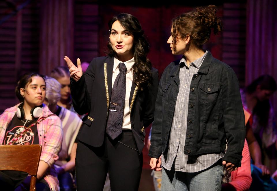 Alexa Liberi, left, as the conductor, and Madi Boveri, as Indigo, perform a scene Monday, April 10, 2023, during rehearsal for South Bend Civic Theatre's production of “My Heart Says Go.”