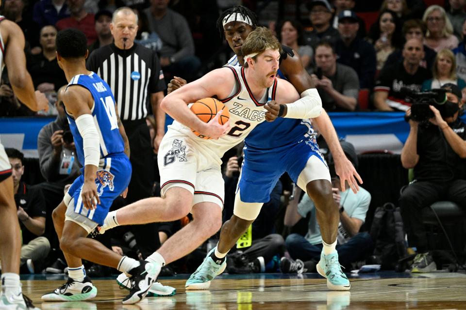 Gonzaga forward Drew Timme (2) drives to the basket against Memphis during the second half in the second round of the 2022 NCAA men's basketball tournament at Moda Center.