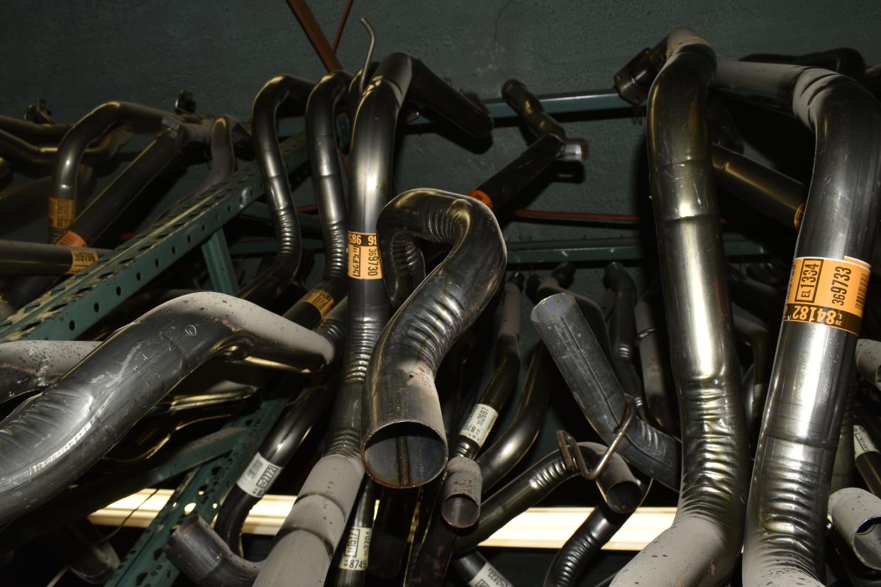 Tailpipes in a storage room at Gosport Auto Supply