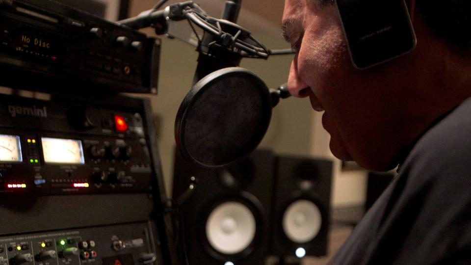 Dave Kapulsky, known as "Dave The Rave," records his weekly radio show out of his Freehold Township home.