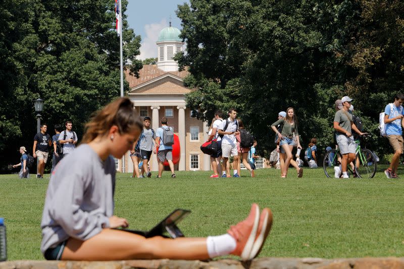 FILE PHOTO: Students walk through the campus of the University of North Carolina at Chapel Hill North Carolina