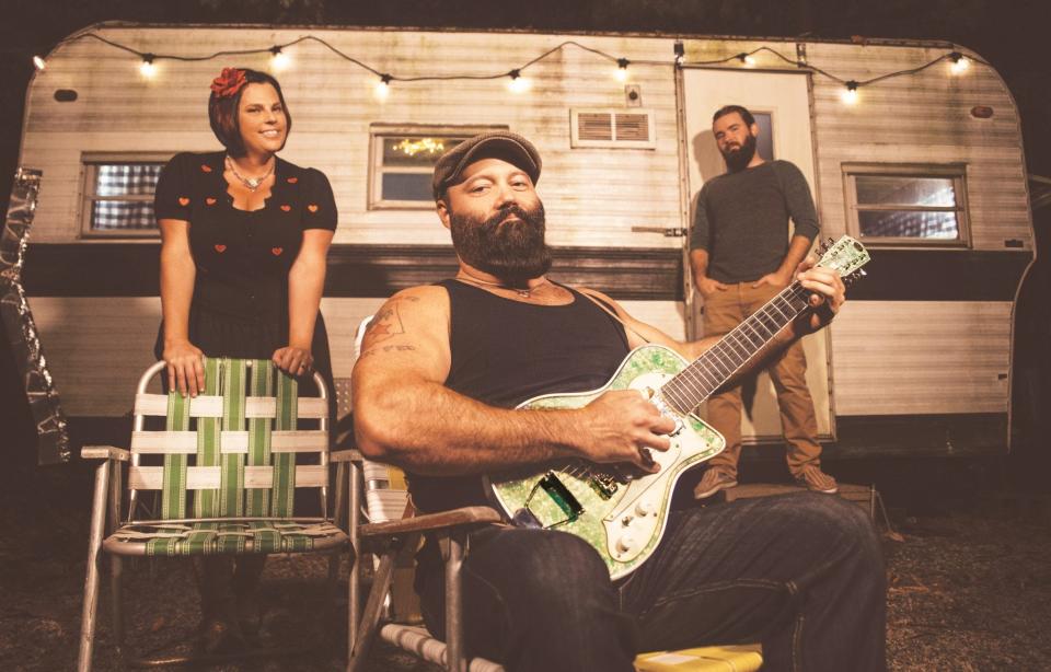 Reverend Peyton's Big Damn Band features, from left, Breezy Peyton on washboard, Reverend Peyton on guitar and  Max Senteney on drums.