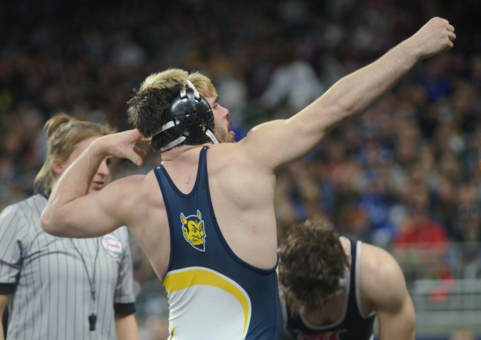 Brayden Gautreau celebrates his second-straight individual state championship during the MHSAA Individual State Finals on Saturday, March 4 at Ford Field in Detroit, Mich.