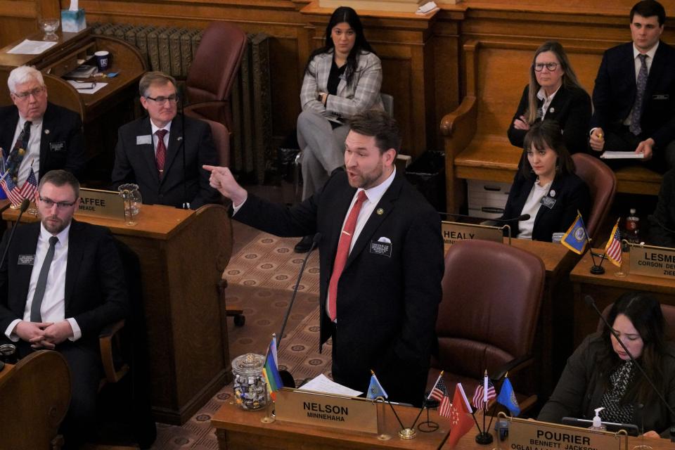 Rep. Kameron Nelson, D-Sioux Falls, speaks on HB 1080 that would limit gender affirming care for transgender children in Pierre on Thursday, Feb. 2.