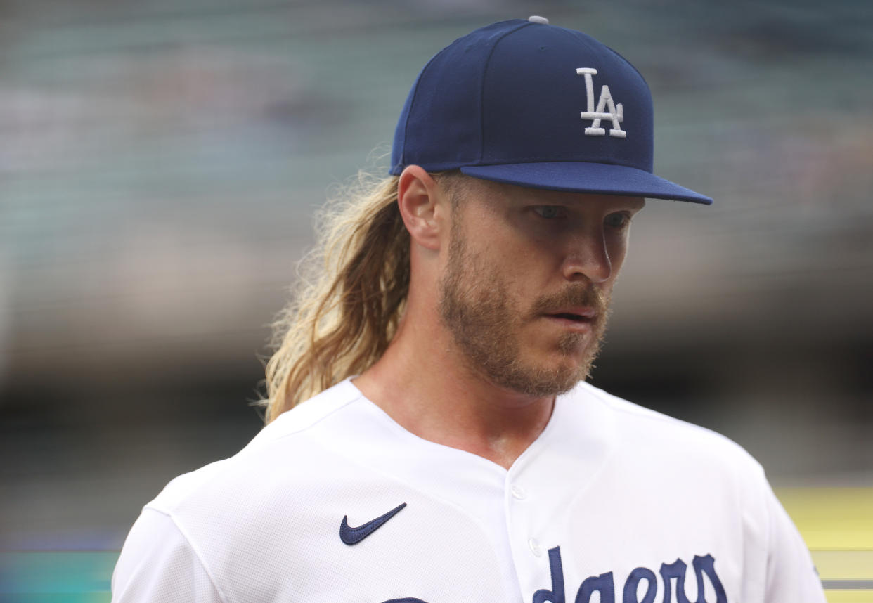 LOS ANGELES, CALIFORNIA - MAY 31: Noah Syndergaard #43 of the Los Angeles Dodgers reacts as he comes to the dugout at the end of the fifth inning against the Washington Nationals at Dodger Stadium on May 31, 2023 in Los Angeles, California. (Photo by Harry How/Getty Images)
