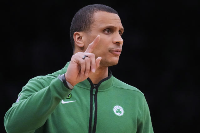 Boston Celtics interim head coach Joe Mazzulla calls to his players during the first half of an NBA basketball game against the Detroit Pistons, Wednesday, Feb. 15, 2023, in Boston. (AP Photo/Charles Krupa)