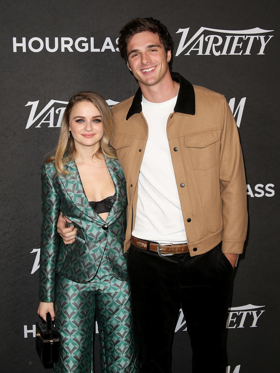 Joey and Jacob smiling together at a media event