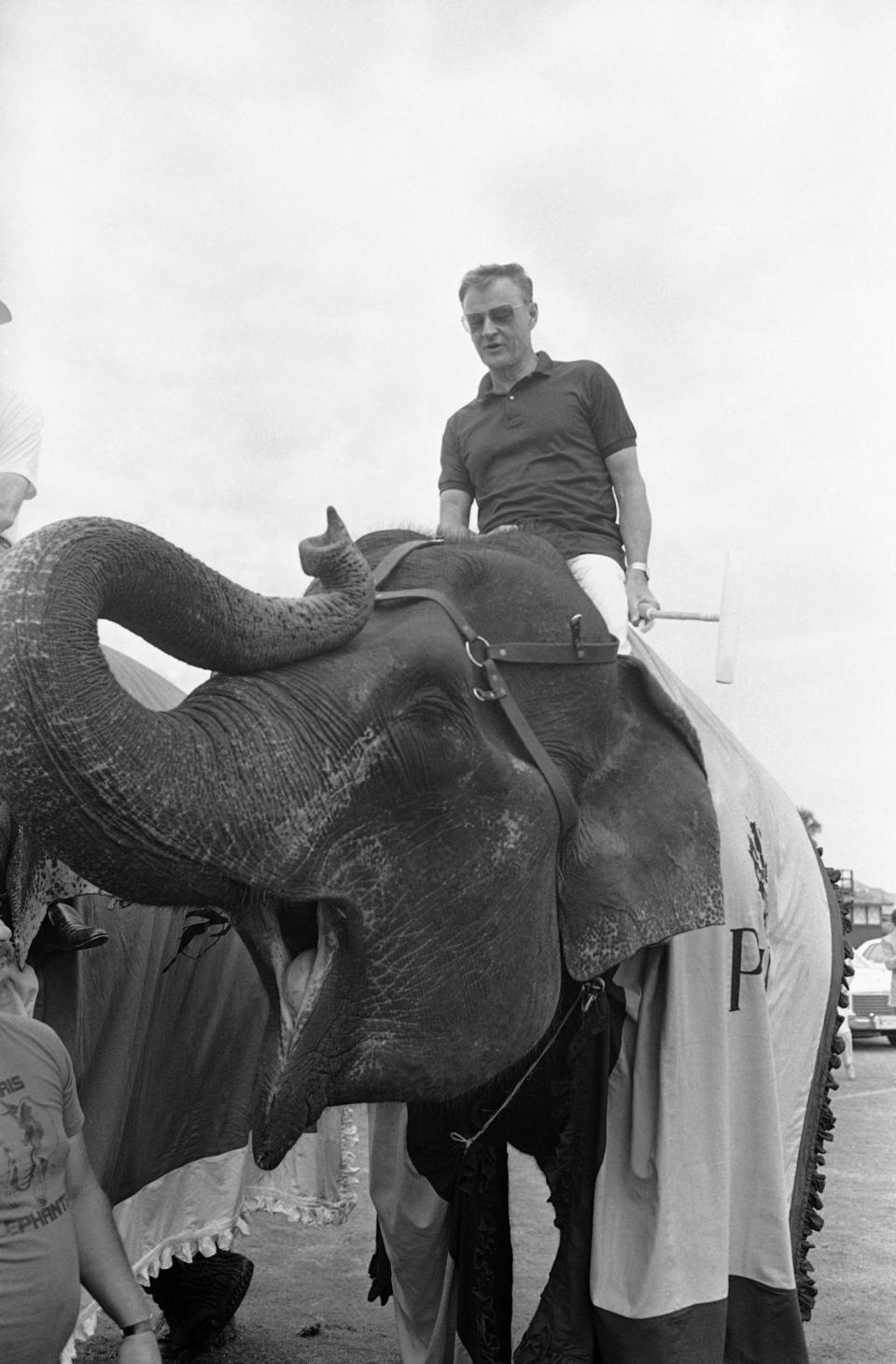 <p>Zbigniew Brzezinski, former National Security Advisor under Pres. Jimmy Carter, demonstrates his form after being shown how to play polo Indian style on an elephant, April 15, 1984, West Palm Beach, Fla. The demonstration was a prelude to the Piaget World Cup Polo Match. (Photo: Ray Fairall/AP) </p>