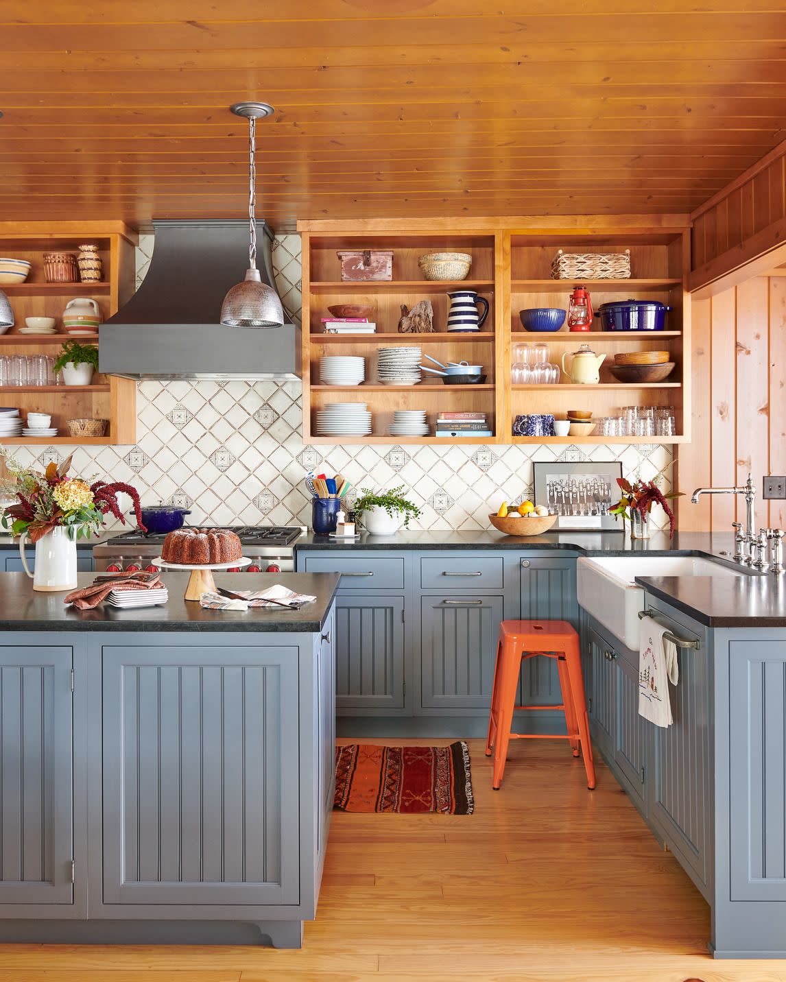 traditional kitchen with blue beadboard cabinets