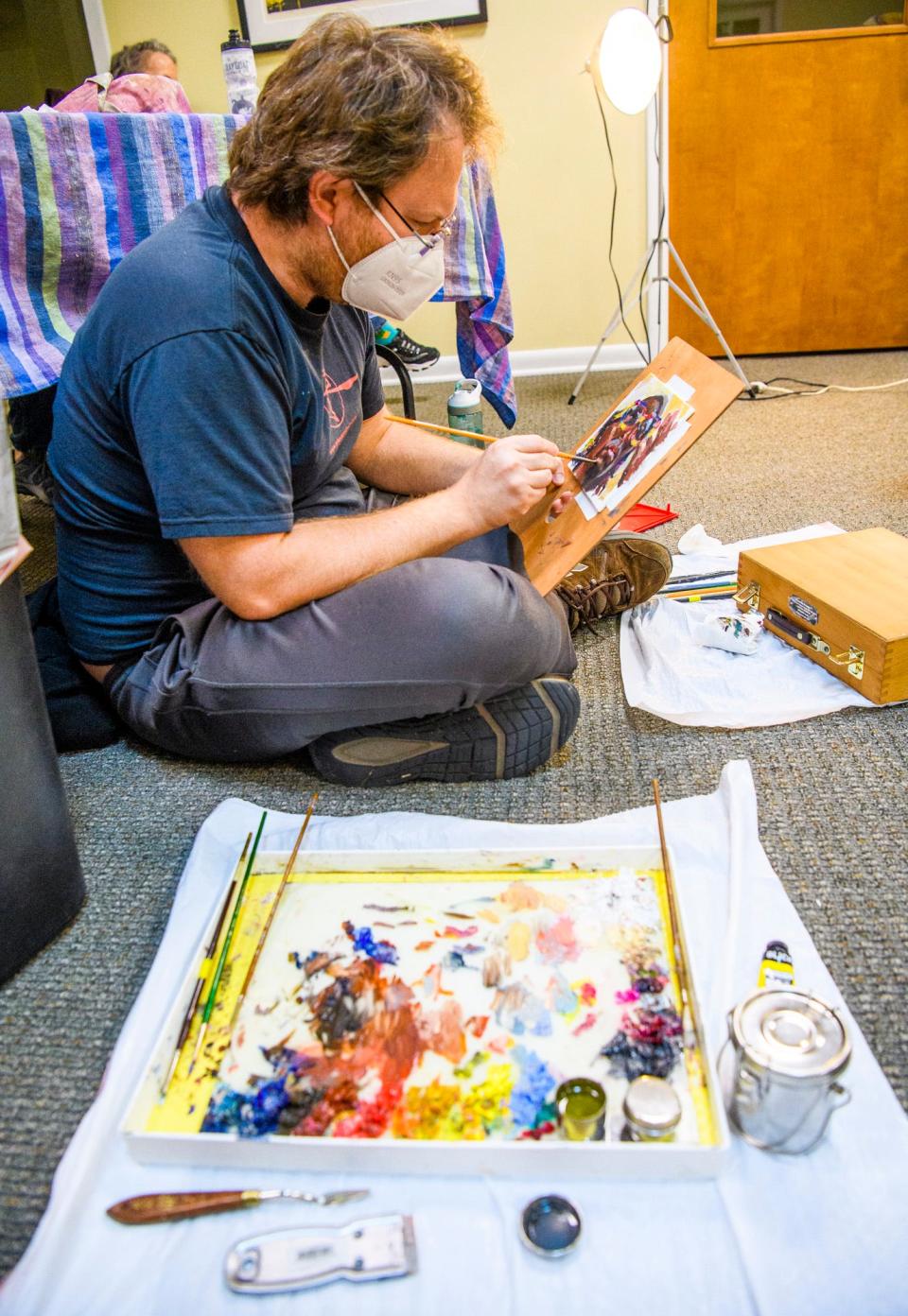 Arkady Roytman works on his oil painting of PDVNCH during the Bloomington Portrait Group's Oct. 28 session with the artist at The Vault at Gallery Mortgage.