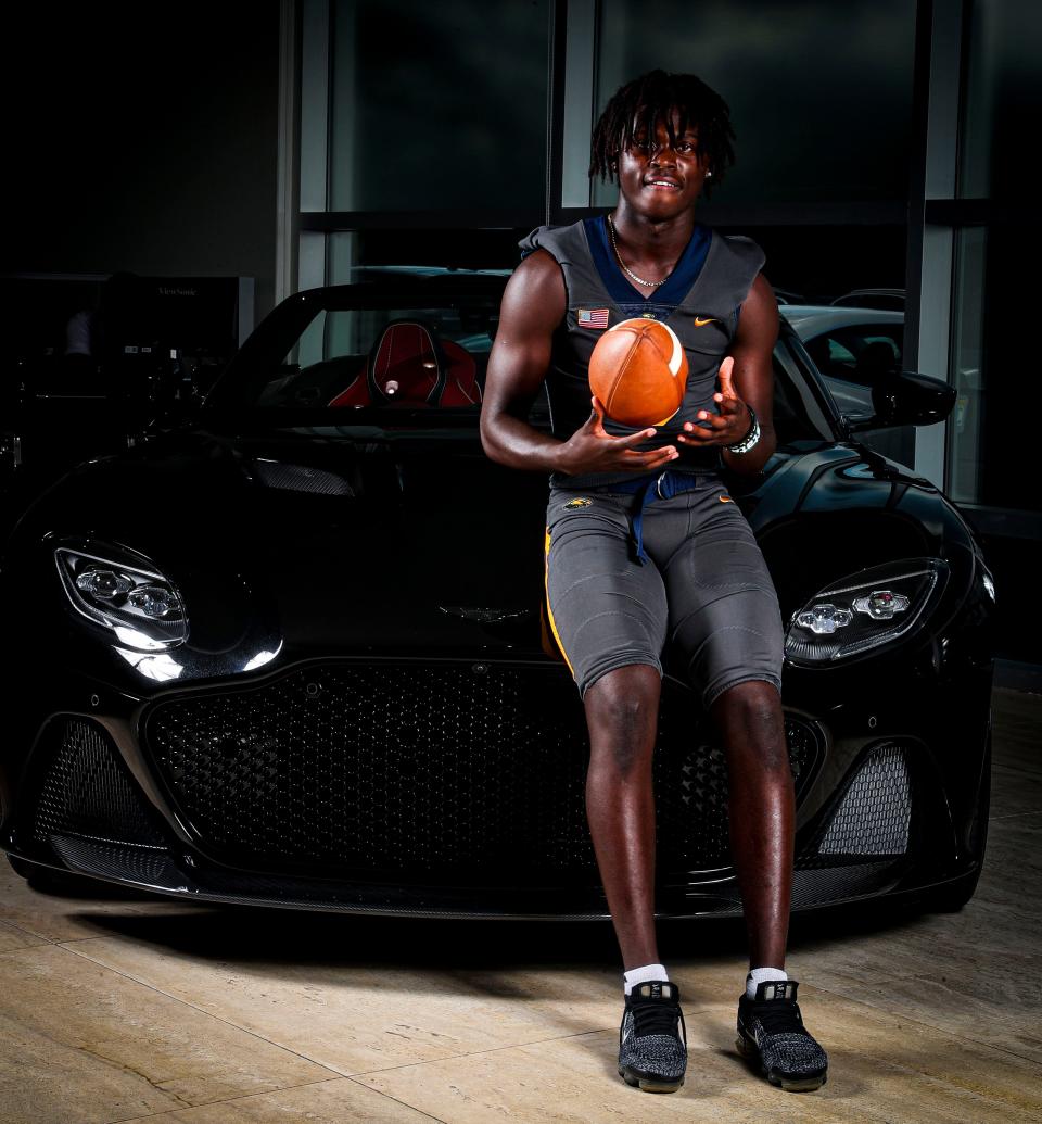 Kensley Faustin, Naples, No. 11 recruit in the Naples Daily News and News-Press' Big 15 for 2022. Cars provided by and photos taken at Naples Luxury Imports. 