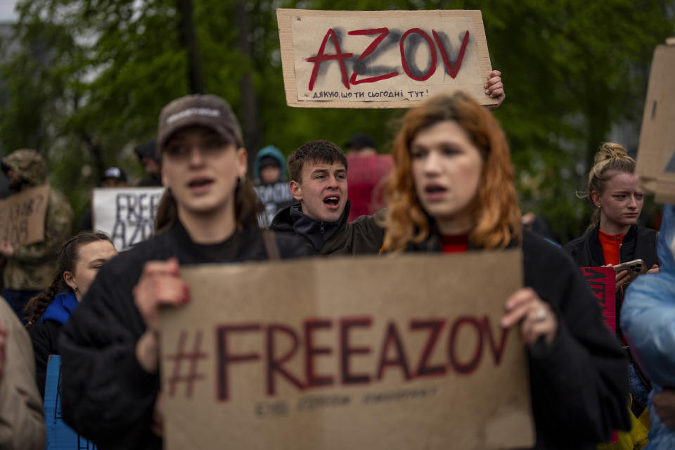 People attend a rally aiming to raise awareness on the fate of Ukrainian prisoners of war in Kyiv, Ukraine, Sunday, April 21, 2024. The U.S. House of Representatives swiftly approved $95 billion in foreign aid for Ukraine, Israel and other U.S. allies in a rare Saturday session as Democrats and Republicans banded together after months of hard-right resistance over renewed American support for repelling Russia's invasion. (AP Photo/Francisco Seco)