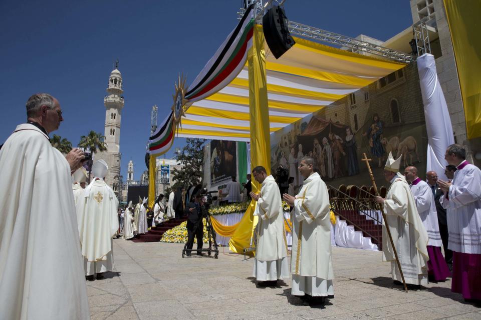 Pope Francis celebrates a mass in Manger Square next to the Church of the Nativity, in the West Bank city of Bethlehem