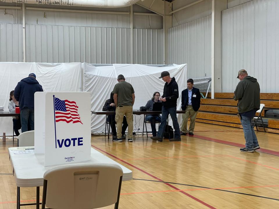 The first voters of Election Day 2023 prepare to vote at Gypsy Hill Park gymnasium in Staunton, on Nov. 7, 2023.