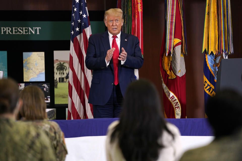 President Donald Trump claps after delivering a speech about the counternarcotics operations at U.S. Southern Command, Friday, July 10, 2020, in Doral, Fla. (AP Photo/Evan Vucci)