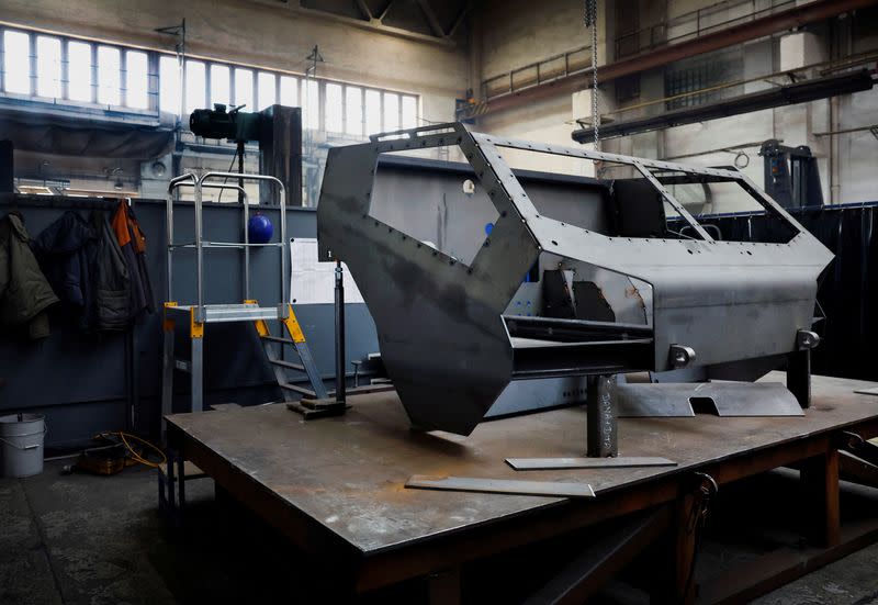 The front of a DITA howitzer-gun vehicle stands inside the arms factory in Sternberk