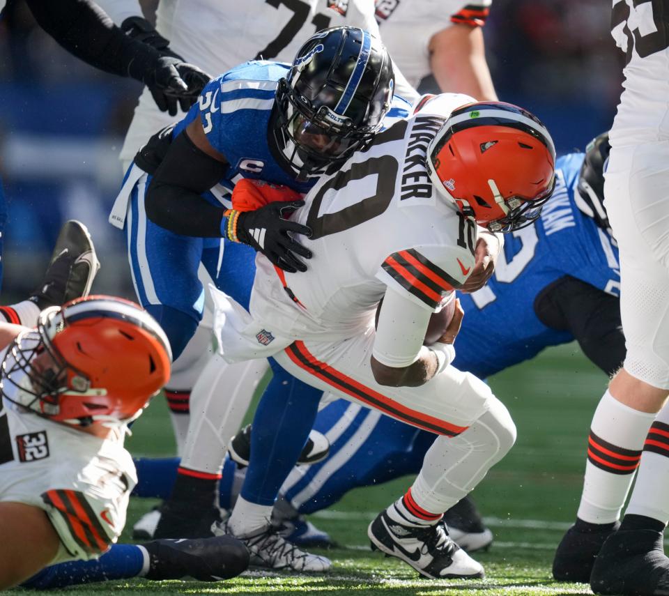 Indianapolis Colts cornerback Kenny Moore II (23) sacks Cleveland Browns quarterback PJ Walker (10) on Sunday, Oct. 22, 2023, during a game against the Cleveland Browns at Lucas Oil Stadium in Indianapolis.